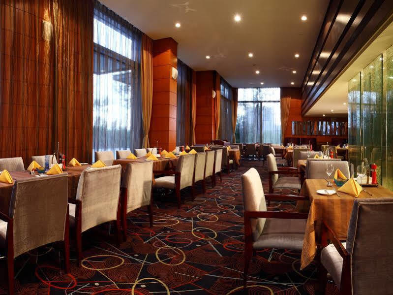 Howard Johnson Plaza Lingang Shanghai Nanhui Exterior foto